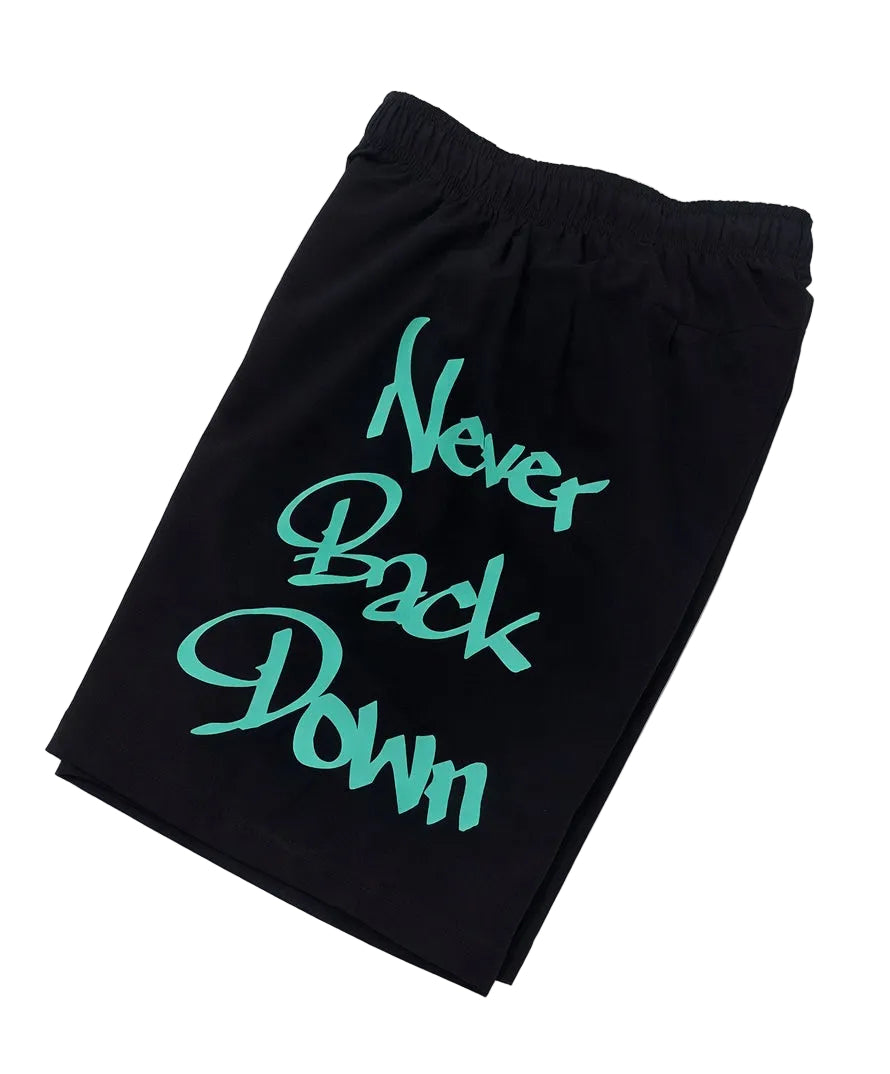 Black sweatpants with 'Never Back Down' text in green on a white background