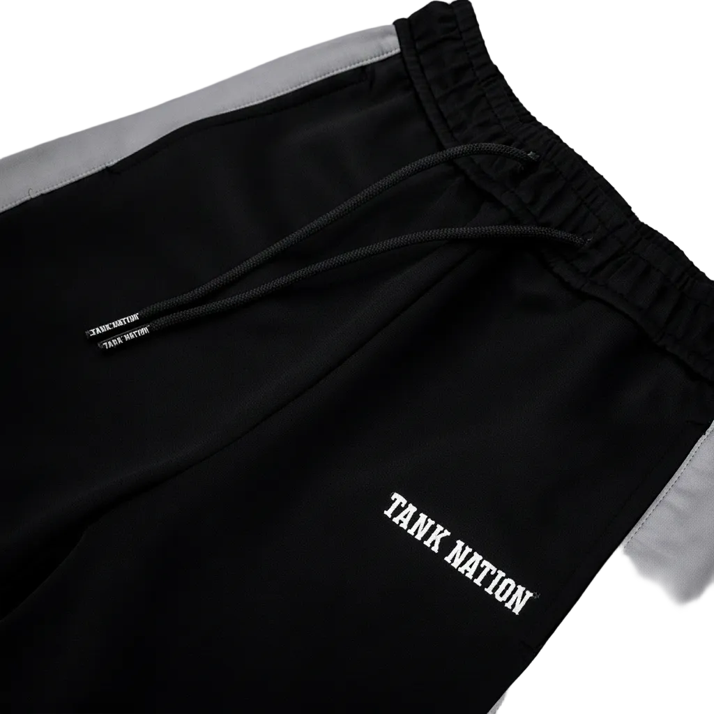 Black shorts with 'Tank Nation' branding on a gray background